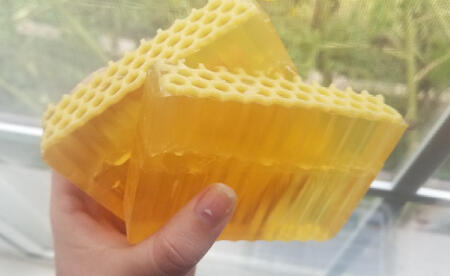 Two pieces of honeycomb shaped soap